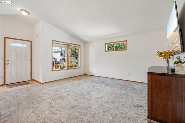 5661 J St, Washougal, WA 98671 - foyer entrance featuring carpet, lofted ceiling, and baseboards