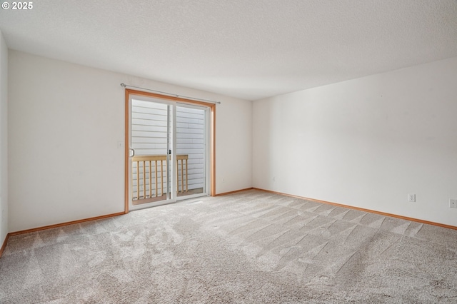 5661 J St, Washougal, WA 98671 - carpeted empty room featuring baseboards and a textured ceiling