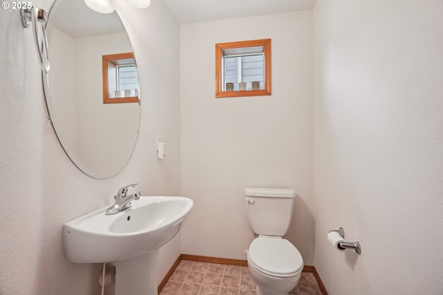 5661 J St, Washougal, WA 98671 - half bath with toilet, baseboards, and a sink