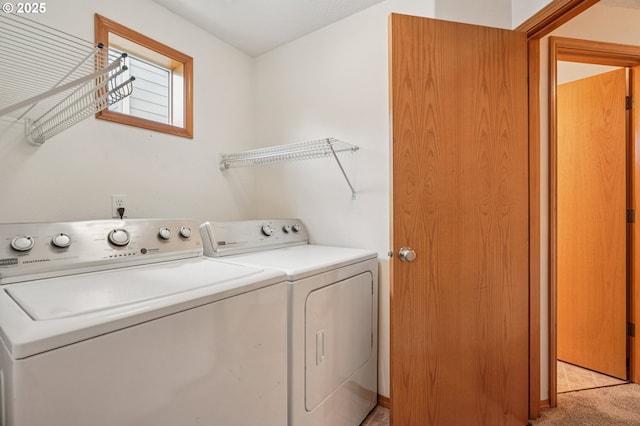 5661 J St, Washougal, WA 98671 - laundry area with washing machine and dryer and light colored carpet
