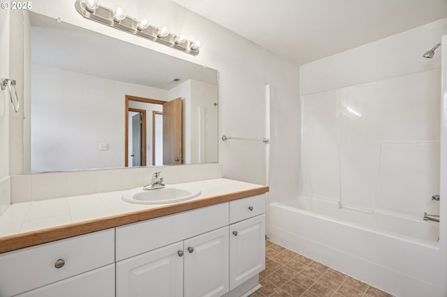 5661 J St, Washougal, WA 98671 - full bathroom featuring vanity, shower / bathtub combination, and tile patterned floors