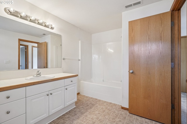 5661 J St, Washougal, WA 98671 - full bath featuring vanity, tile patterned floors, and bathing tub / shower combination