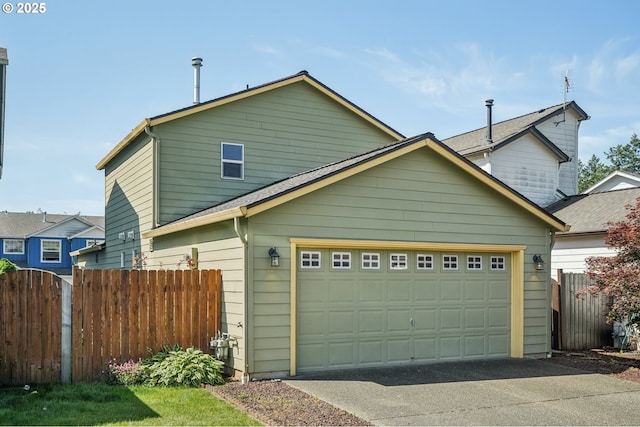5661 J St, Washougal, WA 98671 - view of front facade with driveway and an attached garage