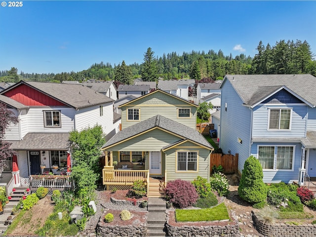 5661 J St, Washougal, WA 98671 - view of front facade featuring covered porch, a residential view, and stairway