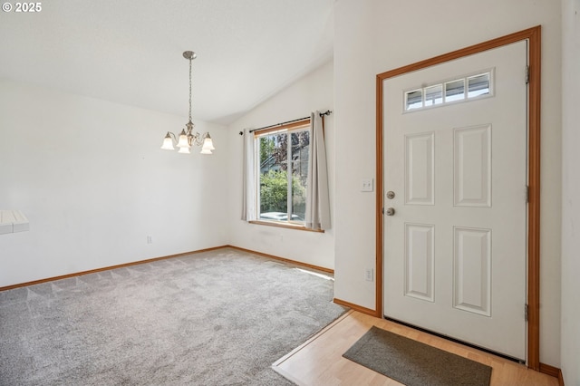 5661 J St, Washougal, WA 98671 - entrance foyer featuring a chandelier, lofted ceiling, baseboards, and light carpet