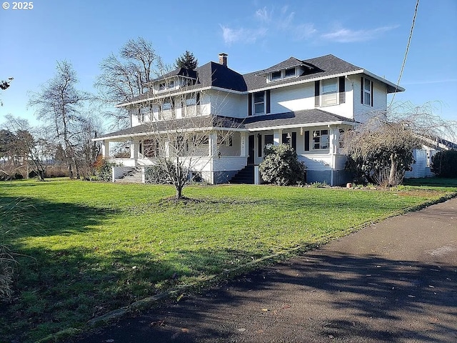 view of front of home with a front yard