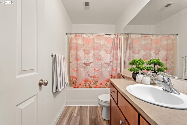 2590 NW 2nd Ter, Gresham, OR 97030 - full bathroom featuring vanity, wood finished floors, and shower / tub combo