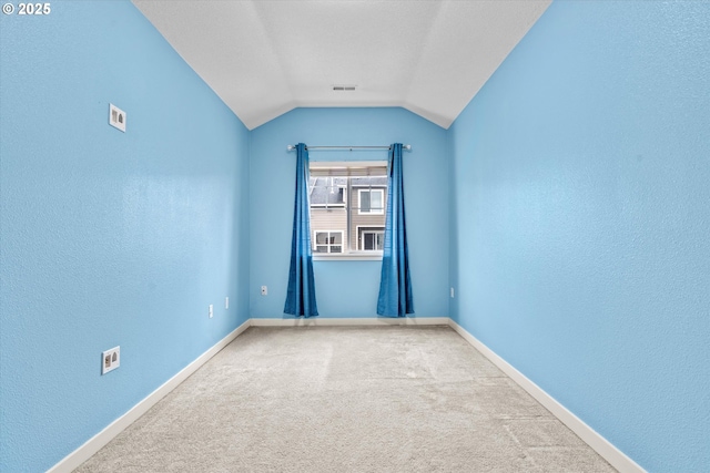 2590 NW 2nd Ter, Gresham, OR 97030 - carpeted spare room featuring lofted ceiling and a textured wall