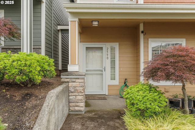 2590 NW 2nd Ter, Gresham, OR 97030 - doorway to property featuring a porch