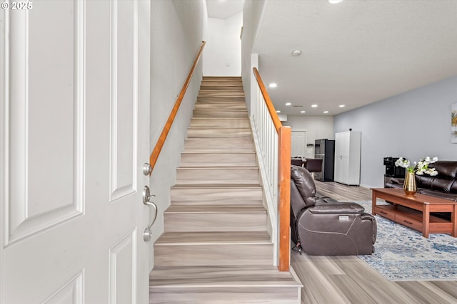 2590 NW 2nd Ter, Gresham, OR 97030 - stairway with wood finished floors and recessed lighting