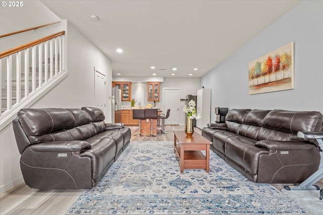 2590 NW 2nd Ter, Gresham, OR 97030 - living room featuring light wood-type flooring, recessed lighting, and stairs