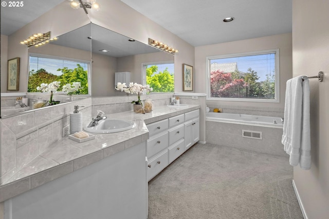 305 SW 169th Pl, Beaverton, OR 97006 - bathroom featuring double vanity and a garden tub