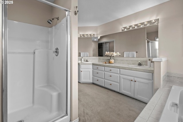 305 SW 169th Pl, Beaverton, OR 97006 - full bath featuring a stall shower, double vanity, and a bathtub