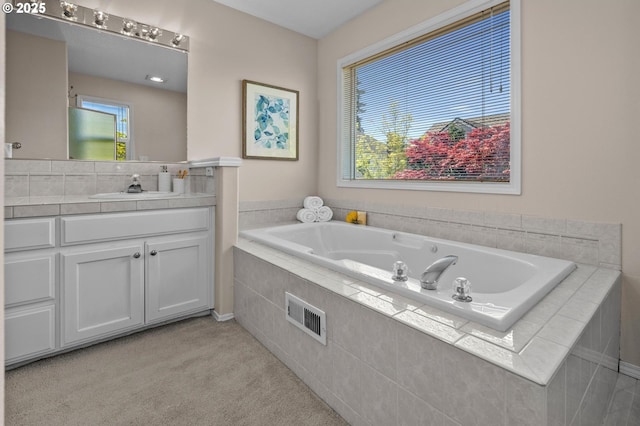 305 SW 169th Pl, Beaverton, OR 97006 - bathroom with a garden tub and vanity