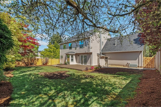 305 SW 169th Pl, Beaverton, OR 97006 - rear view of property featuring a patio area, central air condition unit, and a shingled roof