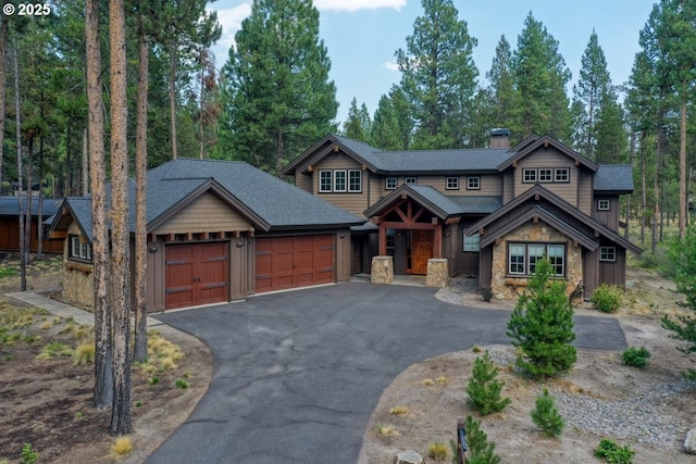 craftsman-style home with a garage