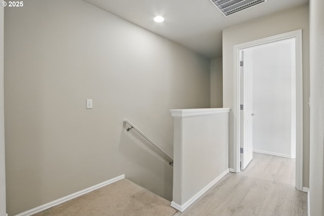 11660 SW Longspur Ter, Beaverton, OR 97007 - hall with an upstairs landing, baseboards, recessed lighting, and wood finished floors