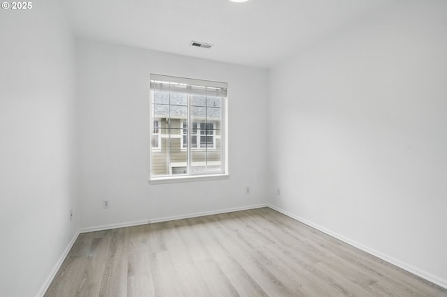 11660 SW Longspur Ter, Beaverton, OR 97007 - empty room featuring wood finished floors and baseboards