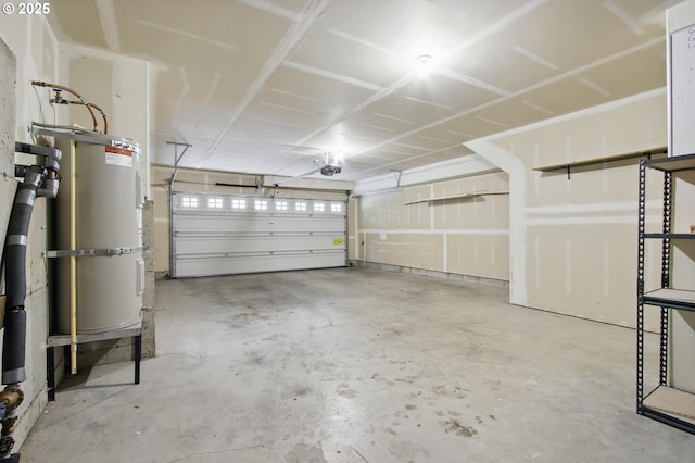 11660 SW Longspur Ter, Beaverton, OR 97007 - garage with strapped water heater and a garage door opener