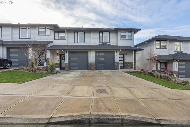 prairie-style home featuring a garage