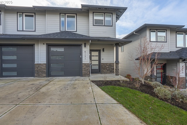 view of front of property featuring a garage