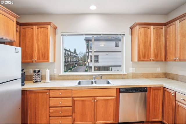 kitchen with appliances with stainless steel finishes and sink