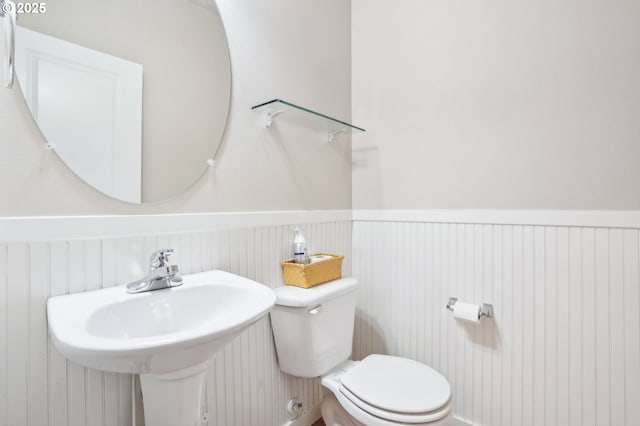 bathroom with toilet and sink