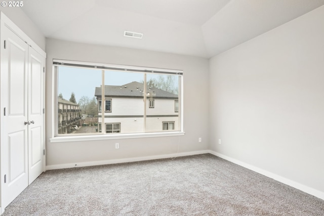 view of carpeted spare room