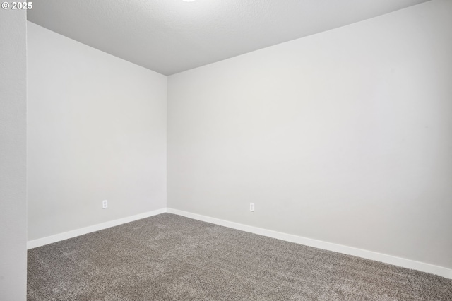 unfurnished room with carpet floors