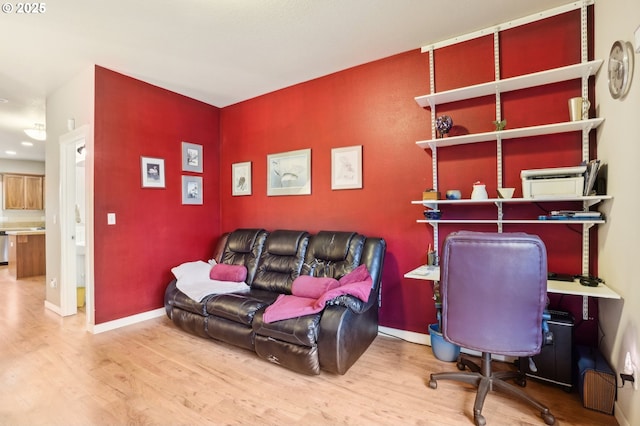 home office with hardwood / wood-style flooring