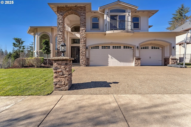 view of front of home featuring stucco siding, an attached garage, a balcony, stone siding, and driveway