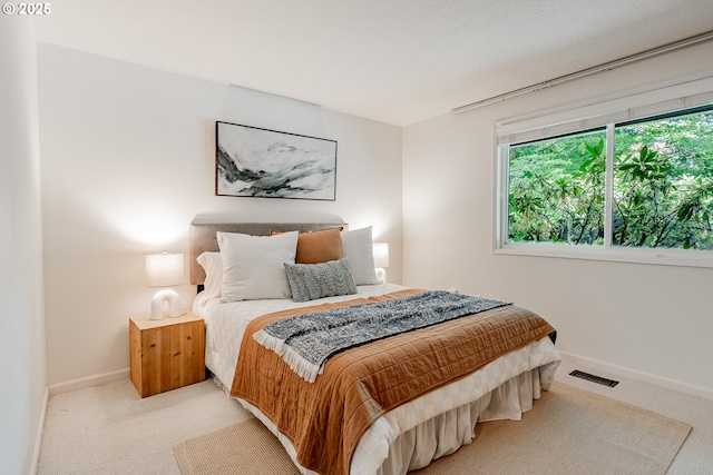 1505 NW 118th Ct, Portland, OR 97229 - bedroom featuring light carpet and baseboards