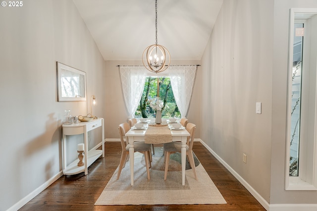 1505 NW 118th Ct, Portland, OR 97229 - dining space featuring a chandelier, vaulted ceiling, and dark wood finished floors