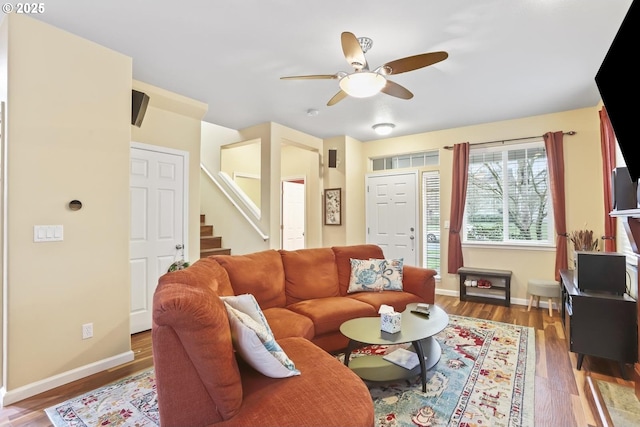 living room with ceiling fan and hardwood / wood-style floors