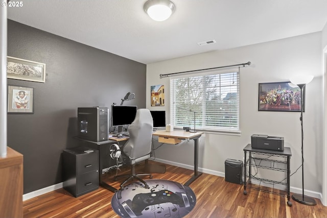 office space with dark hardwood / wood-style floors