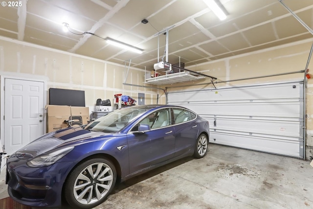 garage featuring a garage door opener