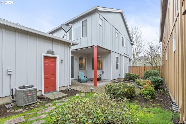 back of house featuring a patio and central air condition unit