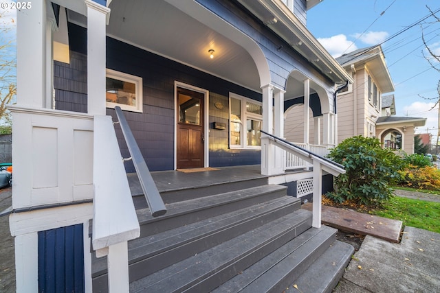 doorway to property featuring a porch