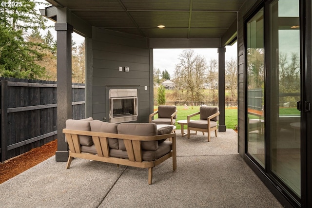 1006 S 48th Pl, Ridgefield, WA 98642 - view of patio featuring an outdoor living space with a fireplace