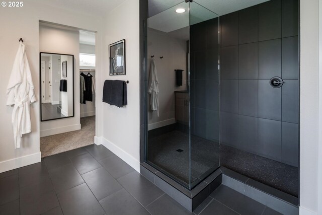 1006 S 48th Pl, Ridgefield, WA 98642 - full bath with baseboards, tiled shower, recessed lighting, and tile patterned flooring