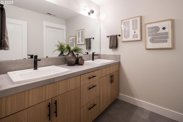 1006 S 48th Pl, Ridgefield, WA 98642 - bathroom with double vanity and baseboards