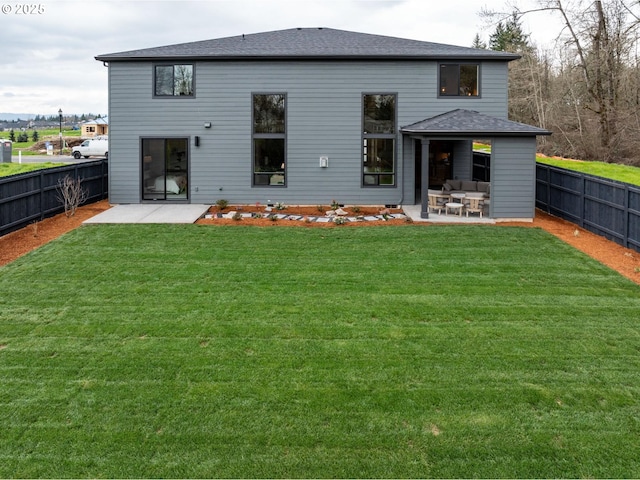 1006 S 48th Pl, Ridgefield, WA 98642 - rear view of property with a patio area, outdoor lounge area, and a shingled roof