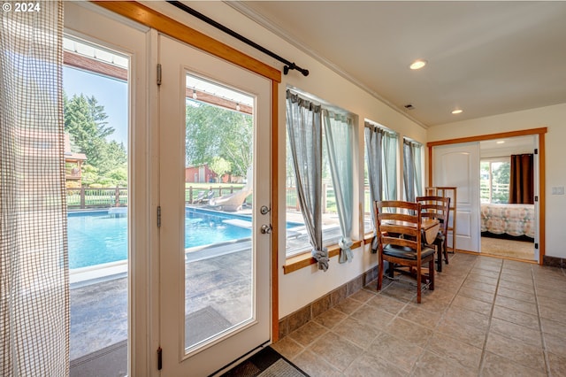 entryway with light tile patterned floors