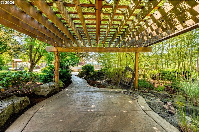 view of patio featuring a pergola