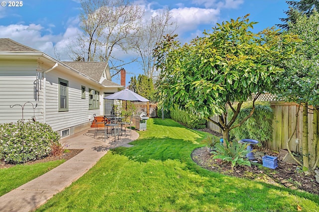 view of yard featuring a fenced backyard and a patio area