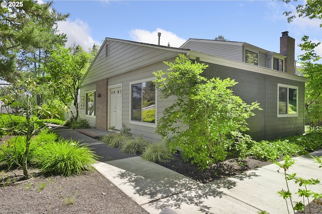 1397 Bonniebrae Dr, Lake Oswego, OR 97034 - view of front of house with a chimney