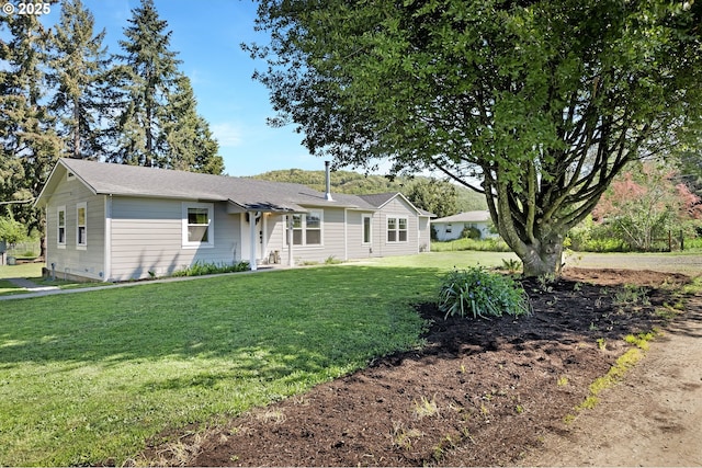 1069 Little Valley Rd, Roseburg, OR 97471 - ranch-style house with a front yard