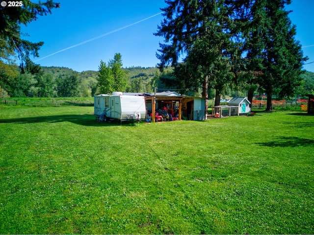 1069 Little Valley Rd, Roseburg, OR 97471 - view of green lawn with an outbuilding