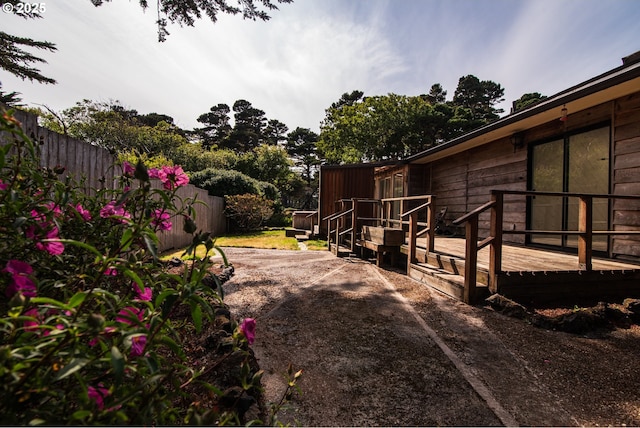 1260 Jackson Ave, Bandon, OR 97411 - view of yard with a deck