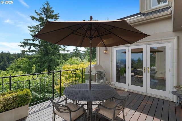 2892 NW Beuhla Vista Ter, Portland, OR 97210 - wooden deck with grilling area and french doors
